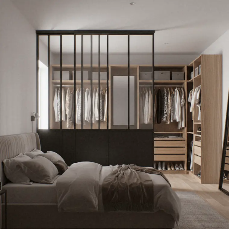 Verrière à barreaudage vertical séparant un dressing d'une chambre